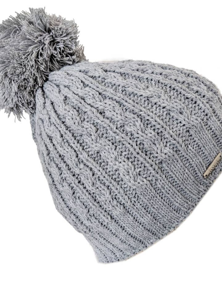 Cappello da donna in acrilico con pompon per la vendita all'ingrosso da parte di Frost Hats
