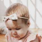 Baby headbands with floral cotton bow for wholesale by Lox Lion