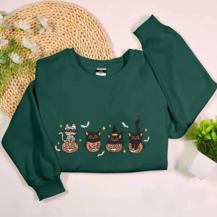 Witchy Cats Pumpkin Embroidered Halloween Sweatshirt for wholesale by Stitchchemy