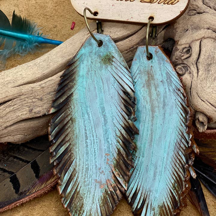 Hand-cut Patina Leather Feather Earrings for wholesale by A Rare Bird Shop
