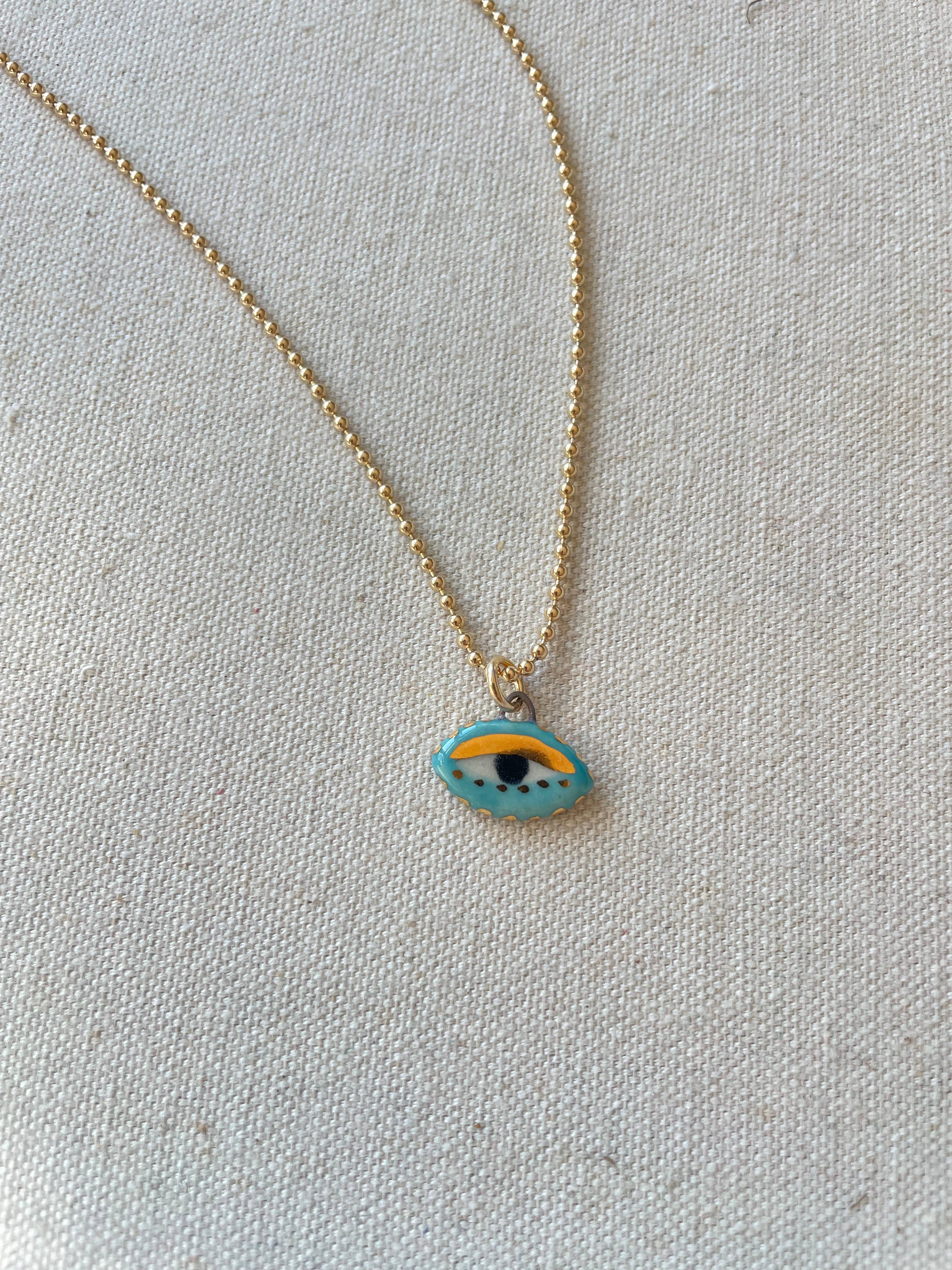 Carola Spitzer – wholesale Pendant/charm necklace – Turquoise Not se evil eye charm Necklace1
