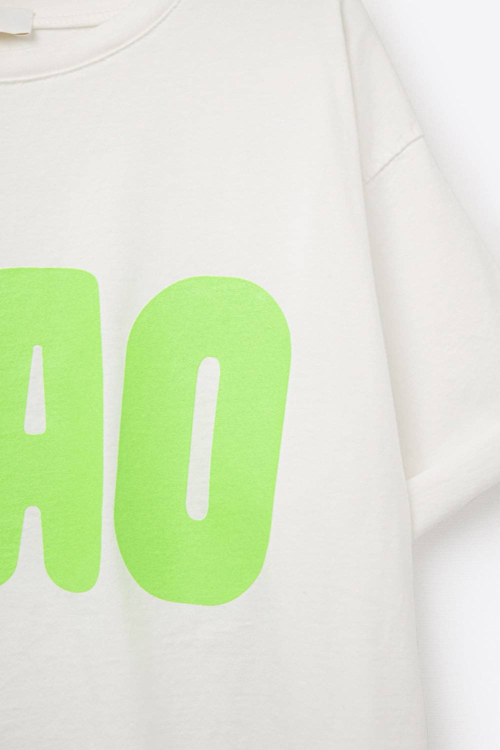 White Relaxed CIAO T-Shirt With Green Letters for wholesale on Faire5