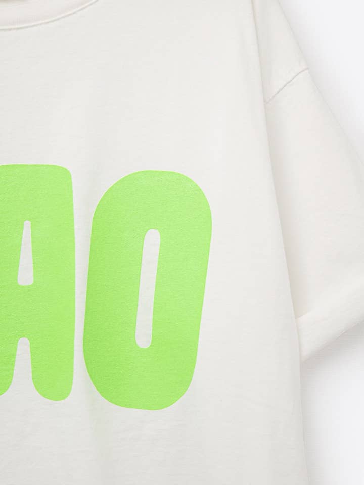 White Relaxed CIAO T-Shirt With Green Letters for wholesale on Faire5