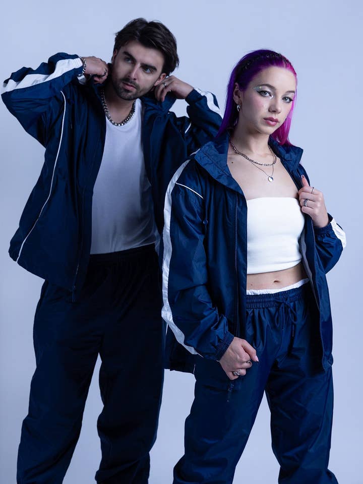 2600S Unisex Full Zipper Taffeta Nylon Tracksuit Jacket and Jogger Set with White Piping (Various Colors) for wholesale by Vos Sports Inc.
