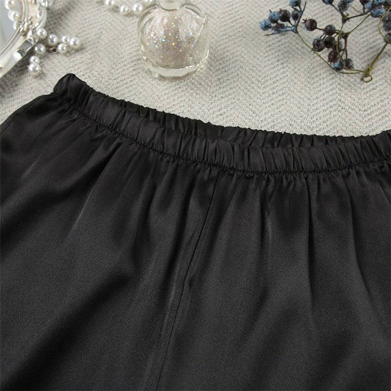 NOIR Ensemble de pyjama deux pièces en patchwork de plumes de couleur unie avec chemisier à manches longues et boutonnage simple en vente sur Faire5