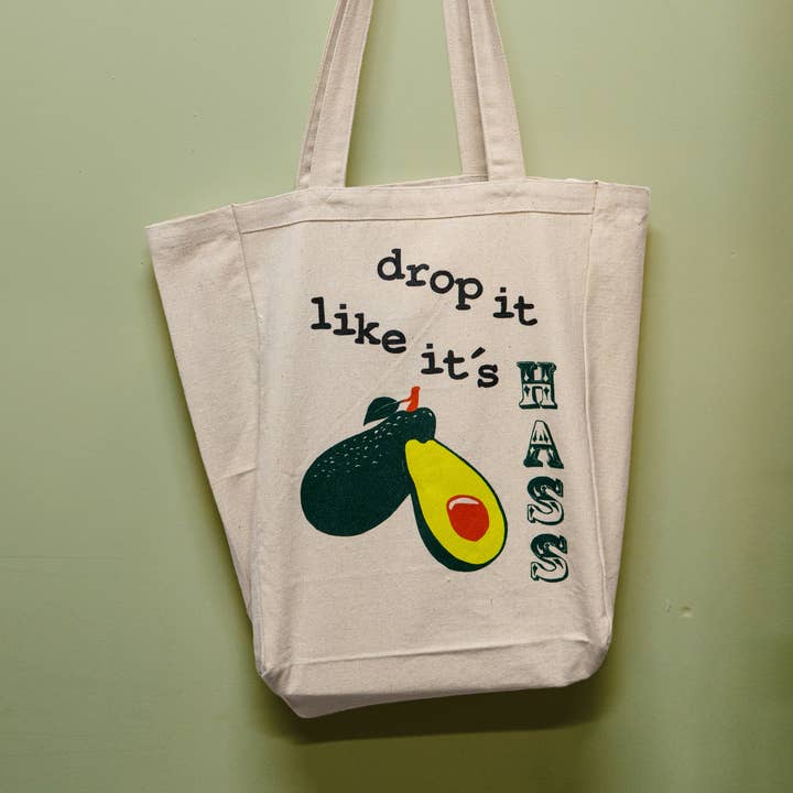 Drop It Like It's Hass 100% Cotton Funny Avocado Tote Bag for wholesale by Inky Mess Press