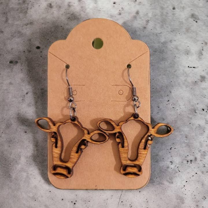 Træ ko dingler for engroshandel hos Ellie Joe Design Co