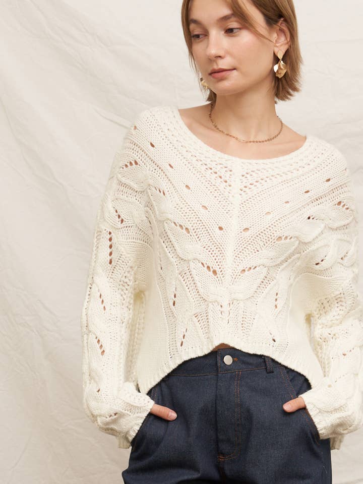 Pull court en tricot torsadé à col en V pour la vente par En Crème
