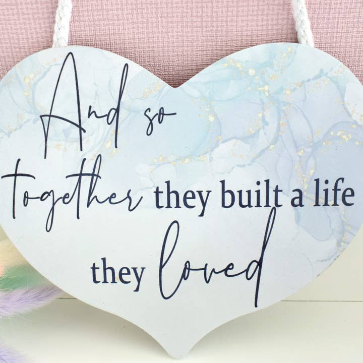 Lived a Life They Loved Hanging Wooden Heart Plaque / Sign for wholesale by Amaya Rose Ltd.