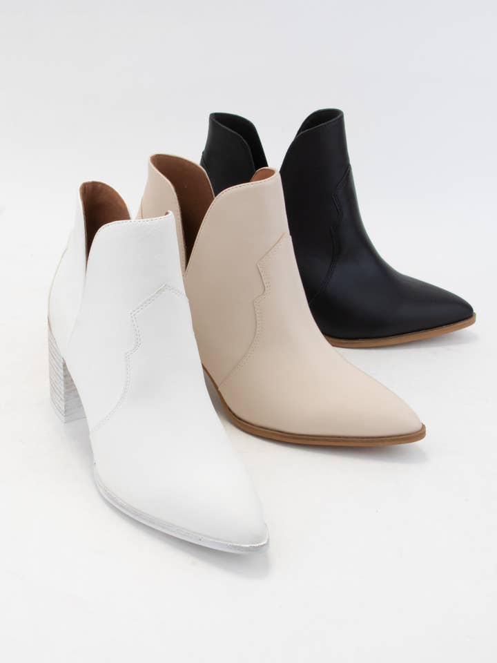 BOTTES WESTERN MODERNES DÉCOUPÉES SUR LE CÔTÉ pour la vente par CCOCCI