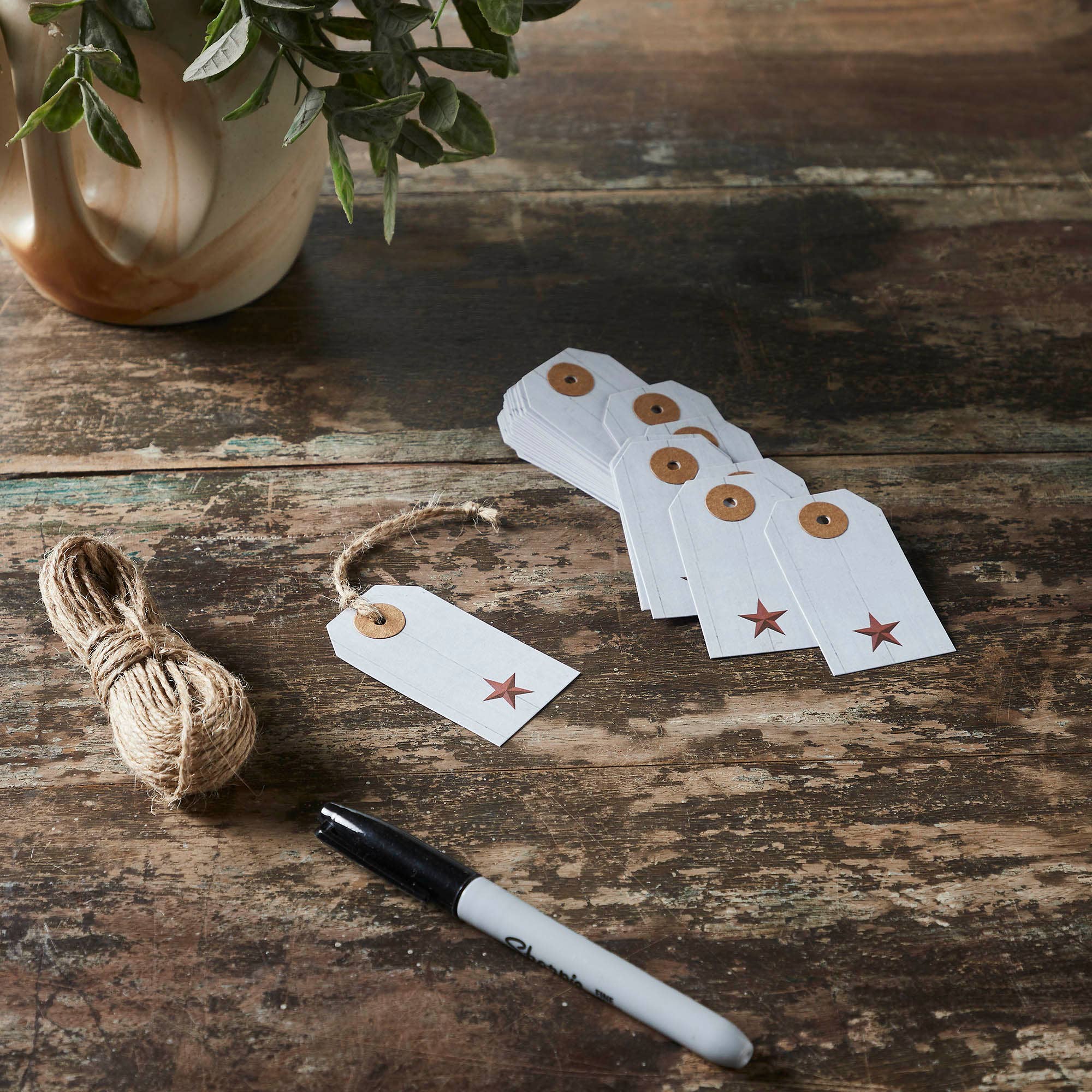 VHC Brands - Wholesale Gift Tag Label - Faceted Barn Star Barnwood Paper Tag Barn Red 2.75x1.5 w/ Twine Set of 500