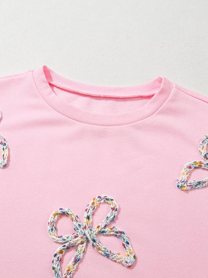 Light Pink Embroidered Bow Lantern Sleeve Oversized Pullover Sweatshirt for wholesale on Faire4