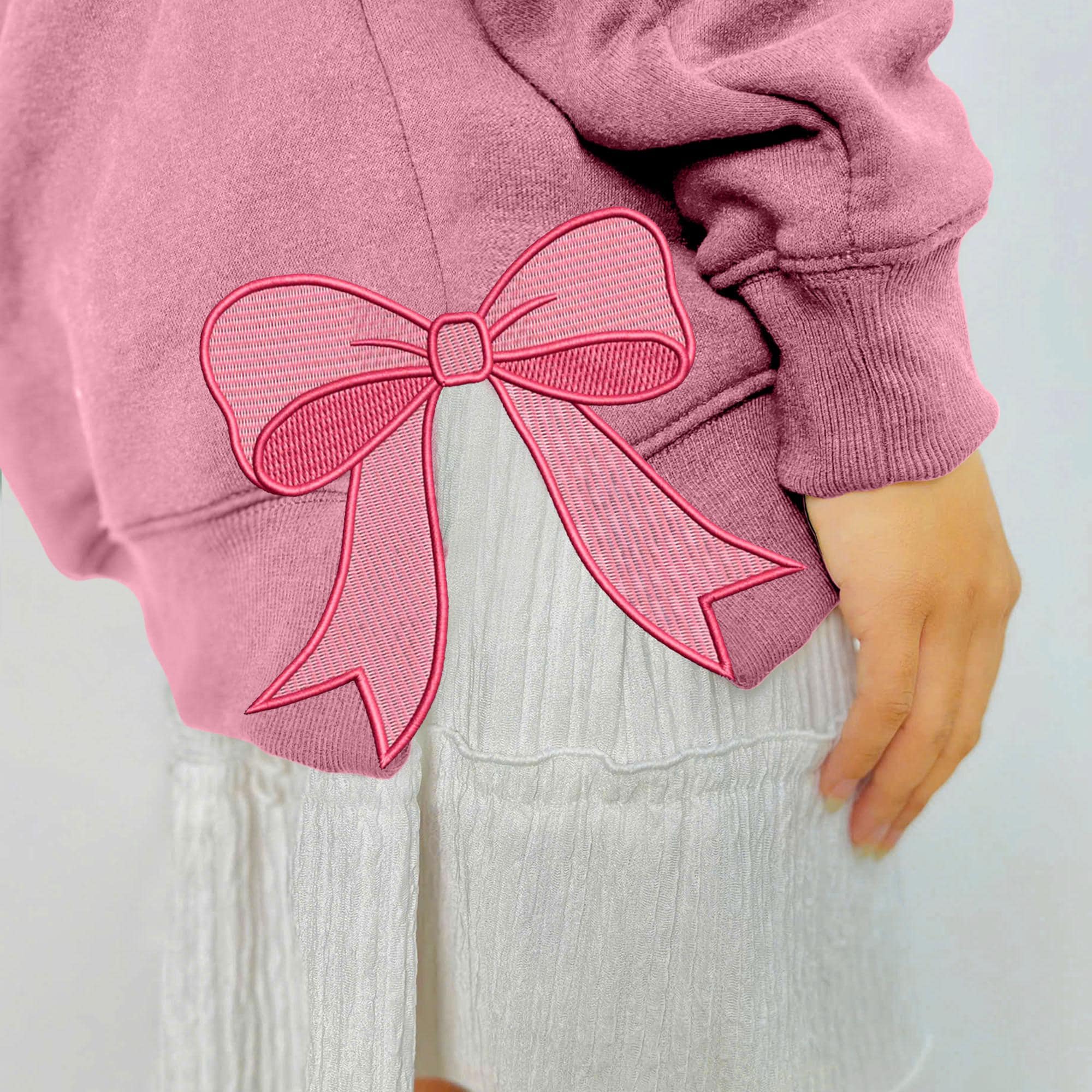 NVC Ecommerce LLC – wholesale Graphic sweatshirt – Women’s – Retro Pink Coquette Lover Embroidered Side Bow Sweatshirt1