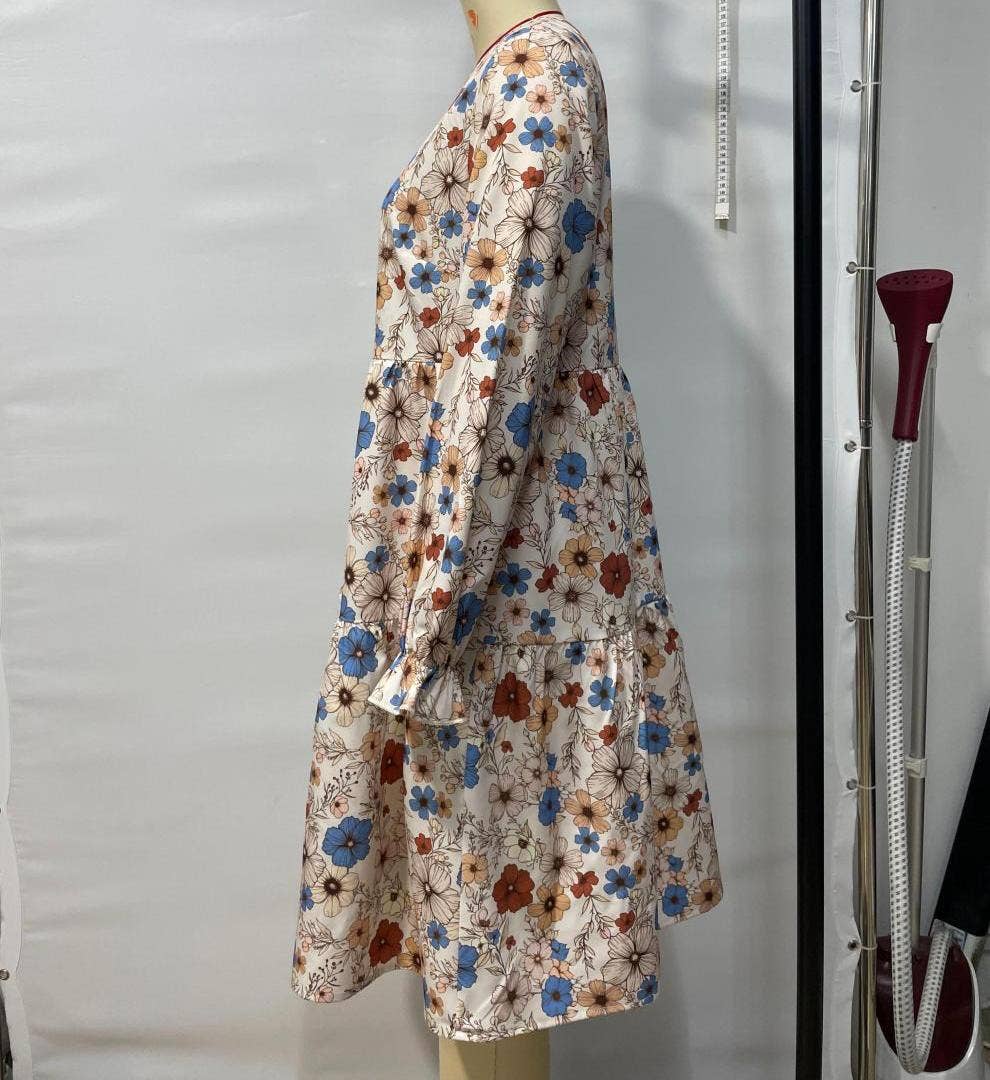 Apricot Floral print bohemian long-sleeves babydoll dress for wholesale on Faire4