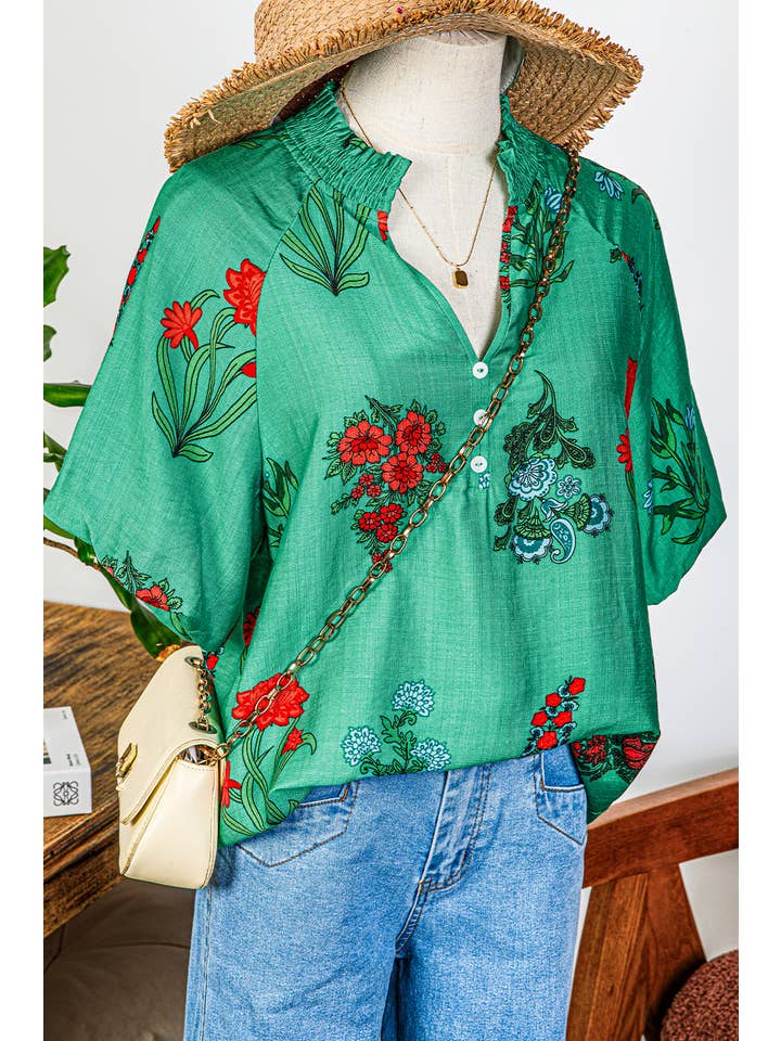 As shown Fashion-W Floral Buttoned V Neck Short Sleeve Blouse for wholesale on Faire