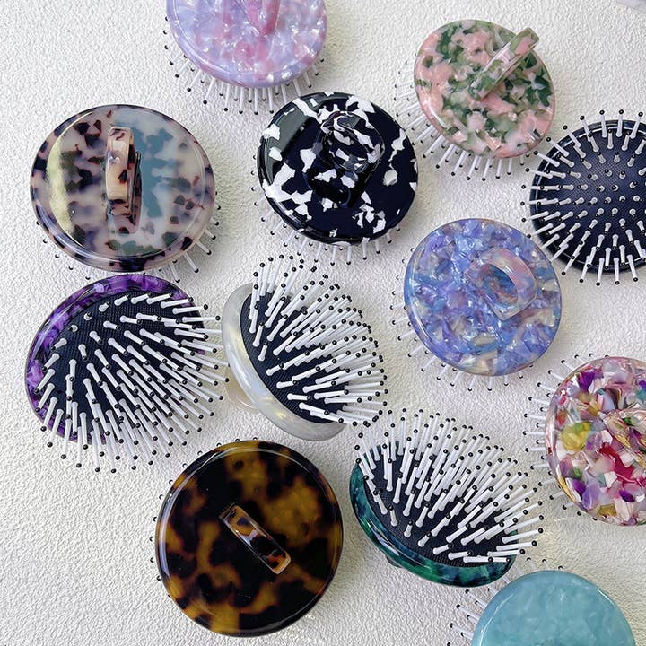 Ring air cushion comb, massage portable hairdressing comb for wholesale by Tourtiwi