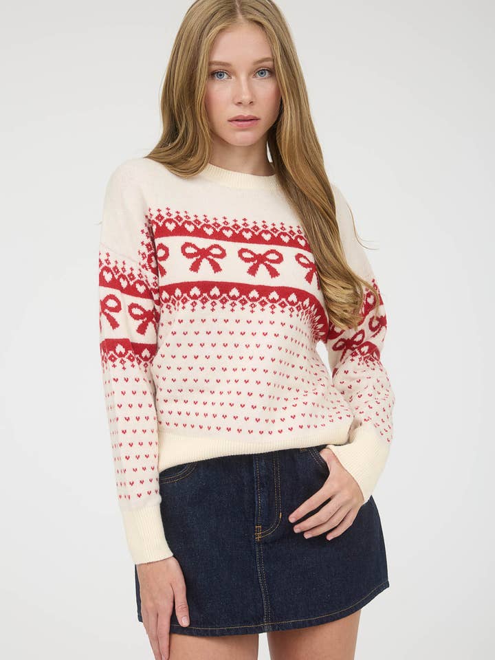 BOW AND HEART JACQUARD KNIT PULLOVER SWEATER  and other Purchase Wholesale bow sweater. Free Returns & Net 60 Terms on Faire trending on Faire.