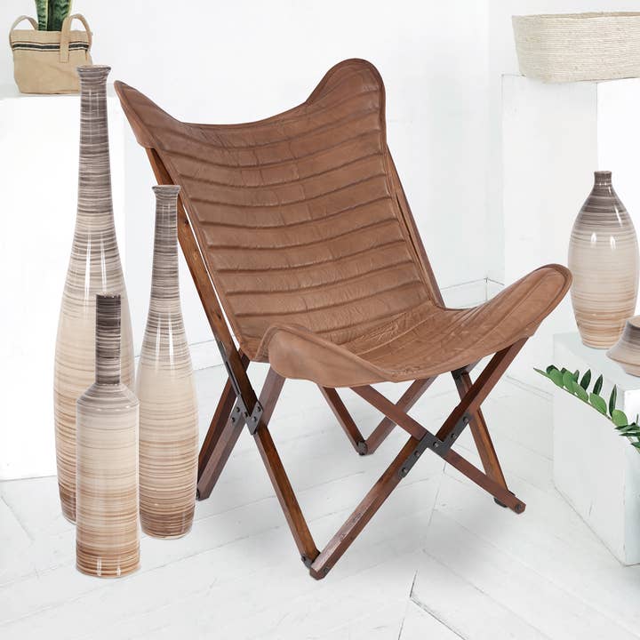 Leather Sling Chair and other Purchase Wholesale wood folding chairs. Free Returns & Net 60 Terms on Faire trending on Faire.