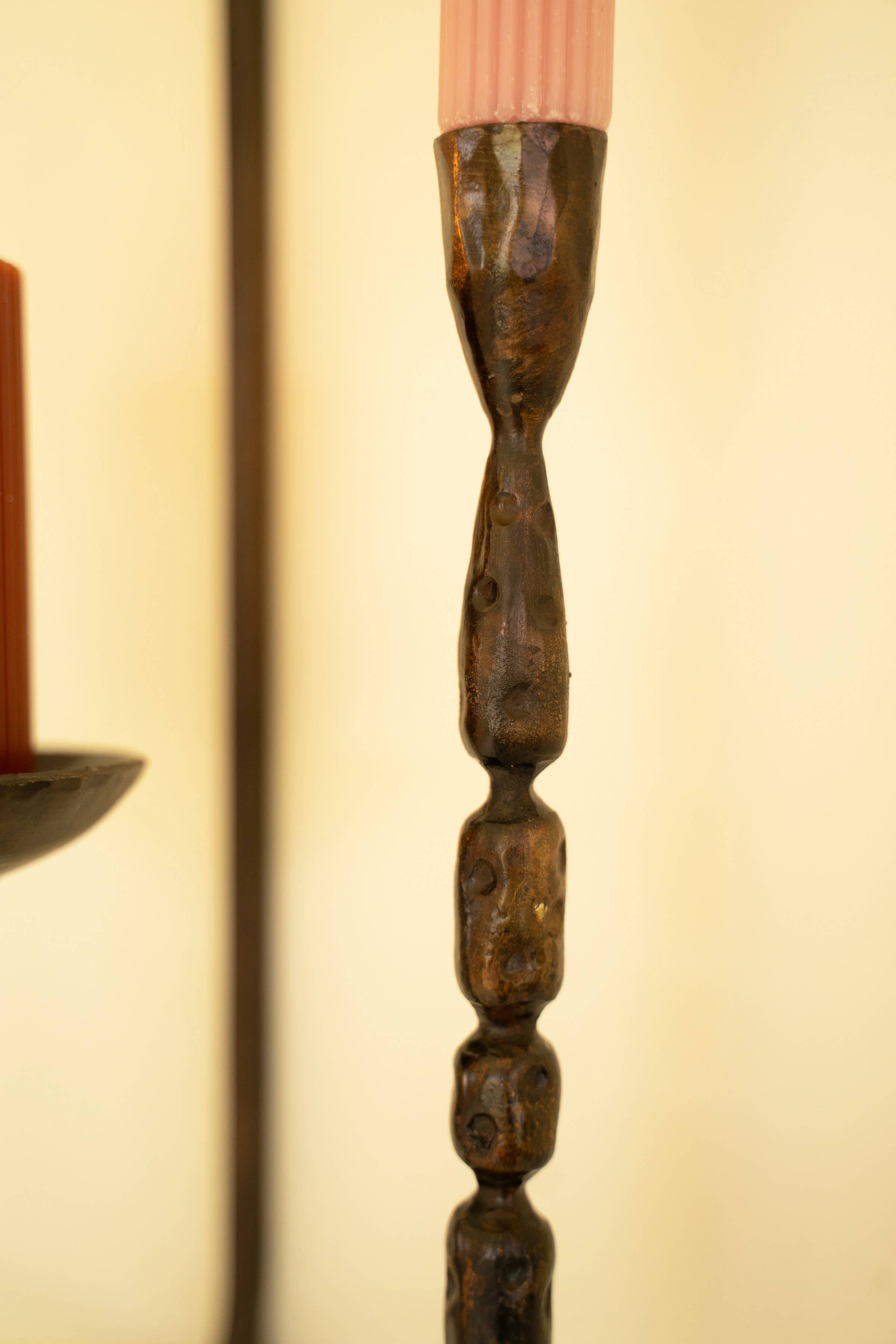 Brown FORGED IRON WALL TAPER AND PILLAR CANDLE HOLDER for wholesale on Faire2