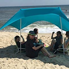 eZthings UV Light Sun Shade Protection Beach Shelters - Lightweight Tent Canopy with Sandbag Anchors for wholesale on Faire2