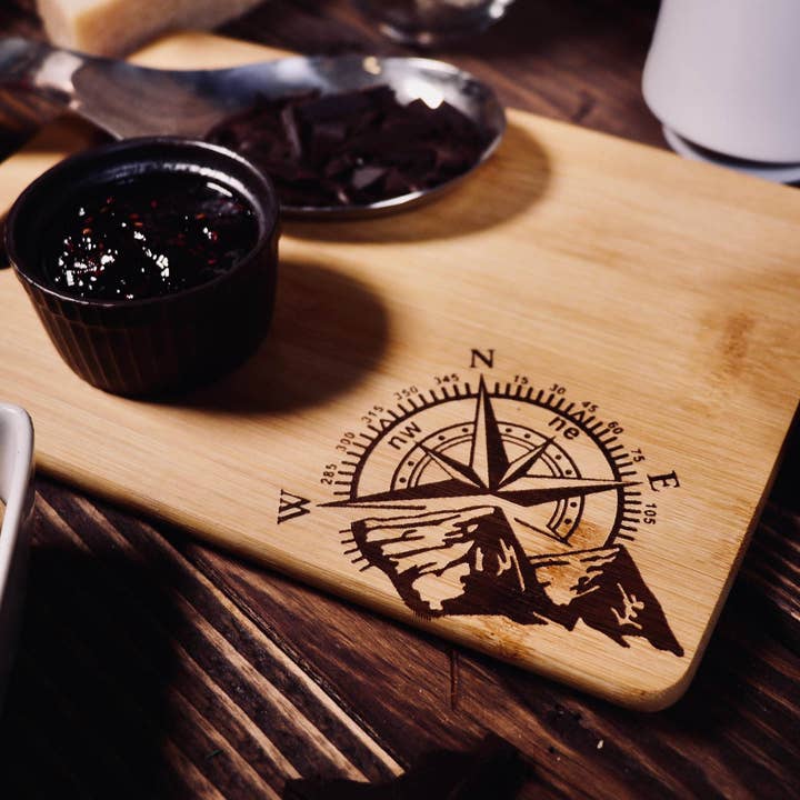 Compass Mountain Adventure Bamboo Cutting, Chopping, Charcuterie Board for wholesale by Rustic Cedar Co