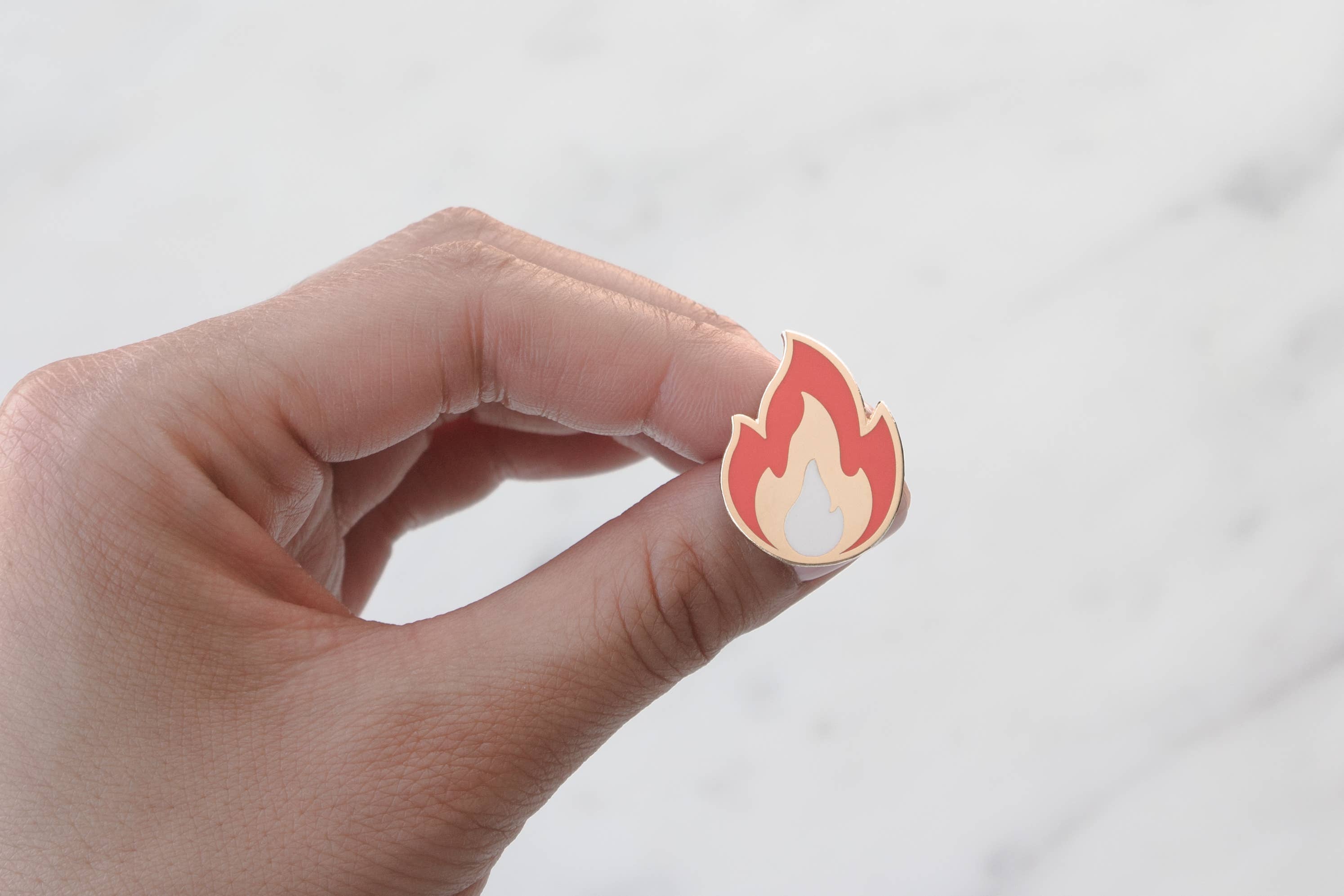 Gold multi Flame Pin for wholesale on Faire1