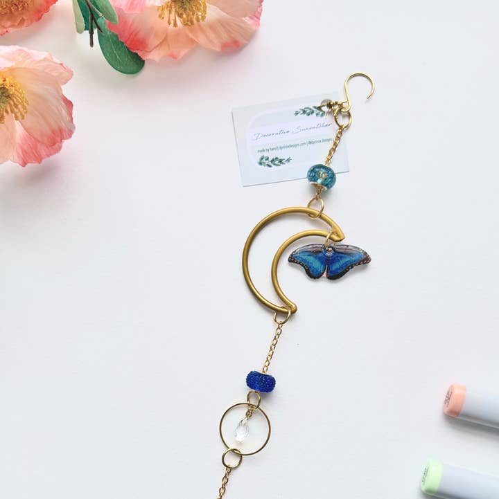 Handmade + Hand-Illustrated Blue Morpho Butterfly Suncatcher with Blue Beads for wholesale by D. Prince Designs