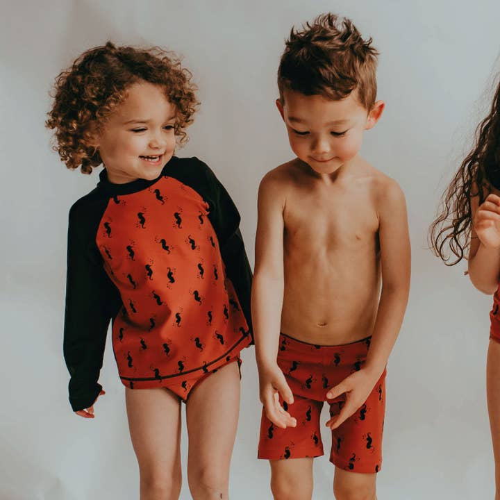 Seahorse Rash Guard Top and other Purchase wholesale plain rash guards. Free returns & net 60 terms on Faire trending on Faire.