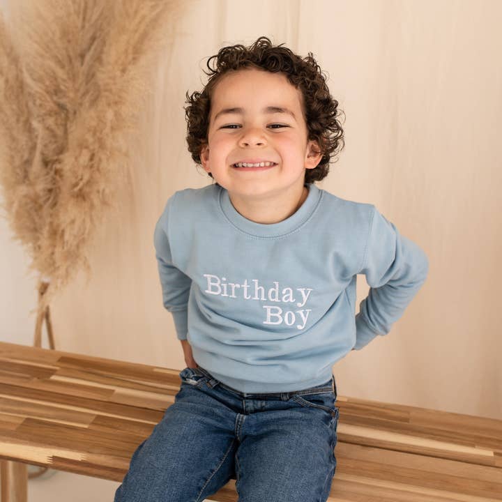 Birthday Boy Embroidered Sweater for wholesale by Amber and Noah