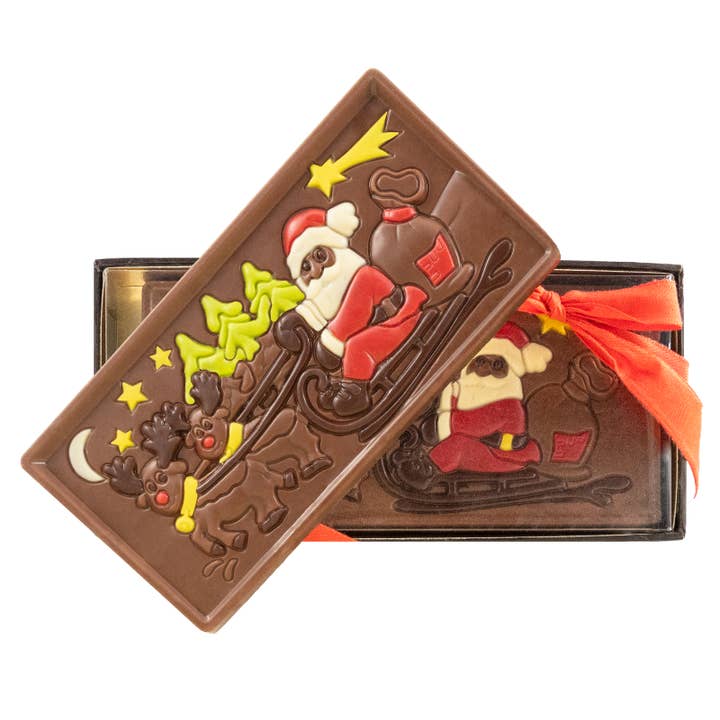 Mælkechokoladejulemand på en slædebar 105g for engroshandel hos The Belgian Chocolate Makers