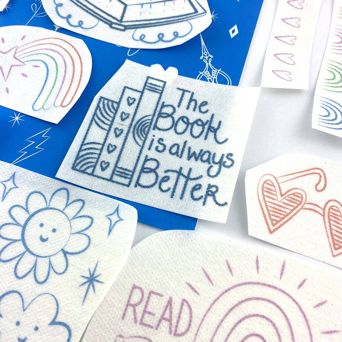 Keller Design Co. - Wholesale Embroidery/Cross Stitch Supplies - Stick It Stitch It Water Soluble Embroidery Patterns-Cats, Books, Rainbows12