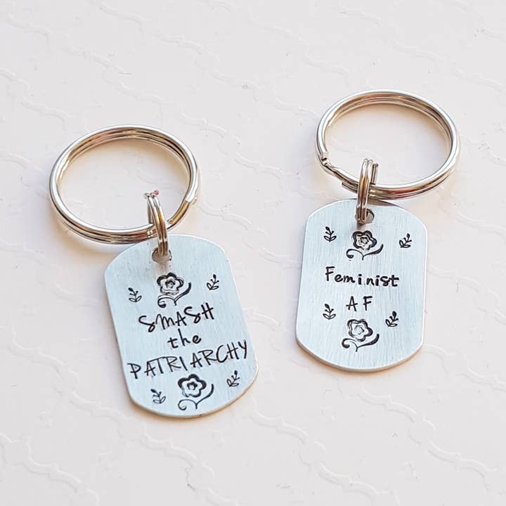 Feminist dog tag keychain for wholesale by Resistance Jewelry