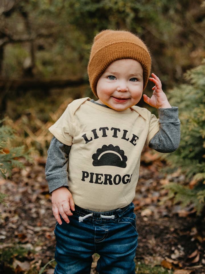 White Little Pierogi Onesie for wholesale on Faire