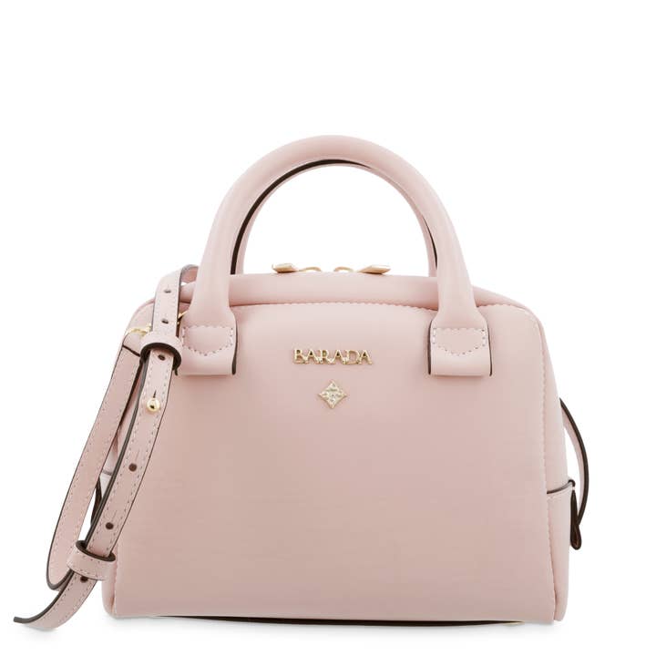 Mini sac en vache et rose
modèle : 4077707 pour la vente par BARADA UBRIQUE