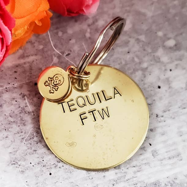 Tequila FTW Brass Key Chain with skull and crossbones tag for wholesale by Salt and Sparkle
