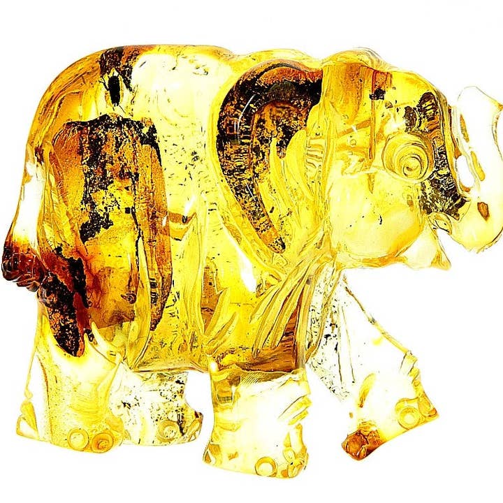 Figurine Superb Quality Handmade Natural Carved Elephant made of Genuine Baltic Amber - CRV63 for wholesale by SilverAmber Jewellery