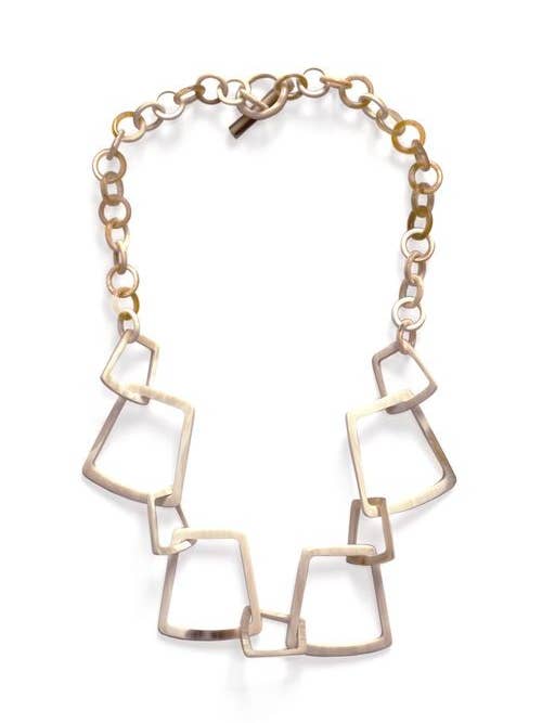 Collier avec bagues de trapèze en corne blonde pour la vente par rivêt - L'Indochineur