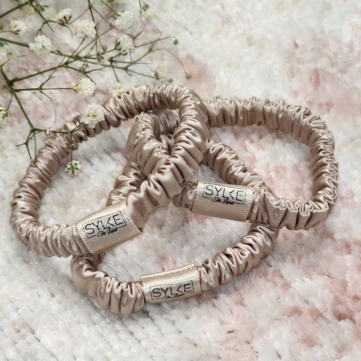 Set de 3 «Skinnies» de seda de morera orgánica en champán y otras tendencias de Resultados para diran regalos al por mayor. Devoluciones gratuitas y condiciones de pago a 60 días en Faire en Faire.