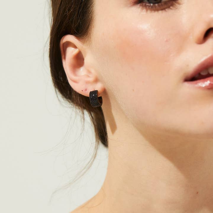 Ruthenium DISCO BLACK PAVE CZ CHUNKY HUGGIE EARRINGS for wholesale on Faire