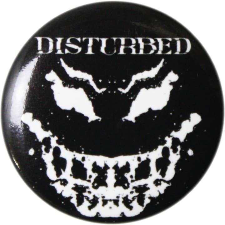 Pin-on Button - 1.25 Inch - Disturbed - Grin for wholesale by Square Deal Recordings & Supplies