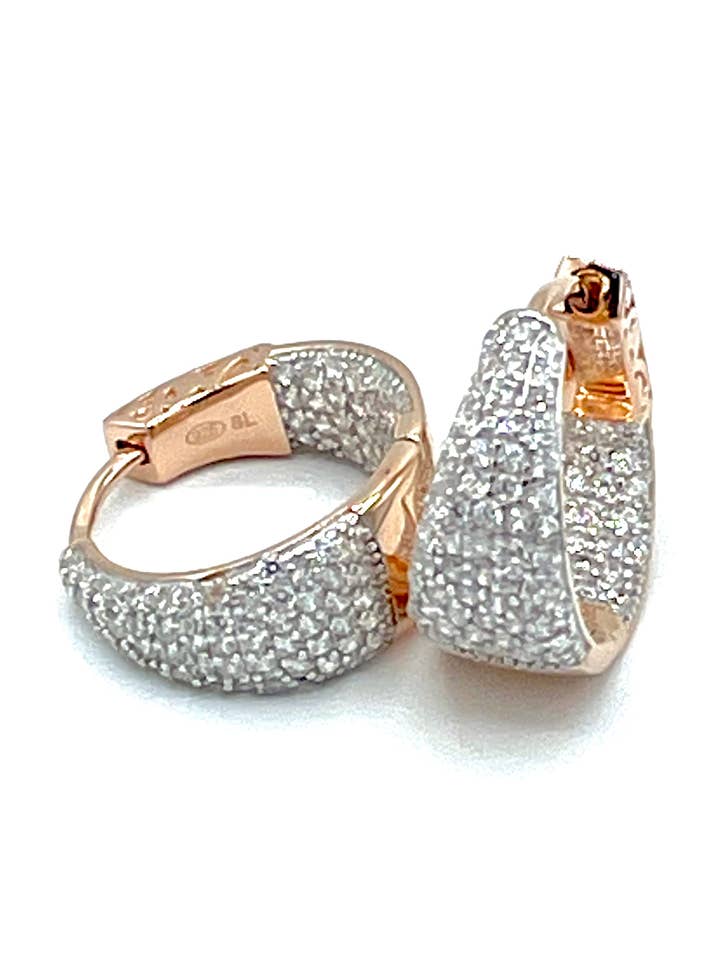 Roues argentées Tit. 925M. Avec des zircones pour la vente par Tererò s.r.l.