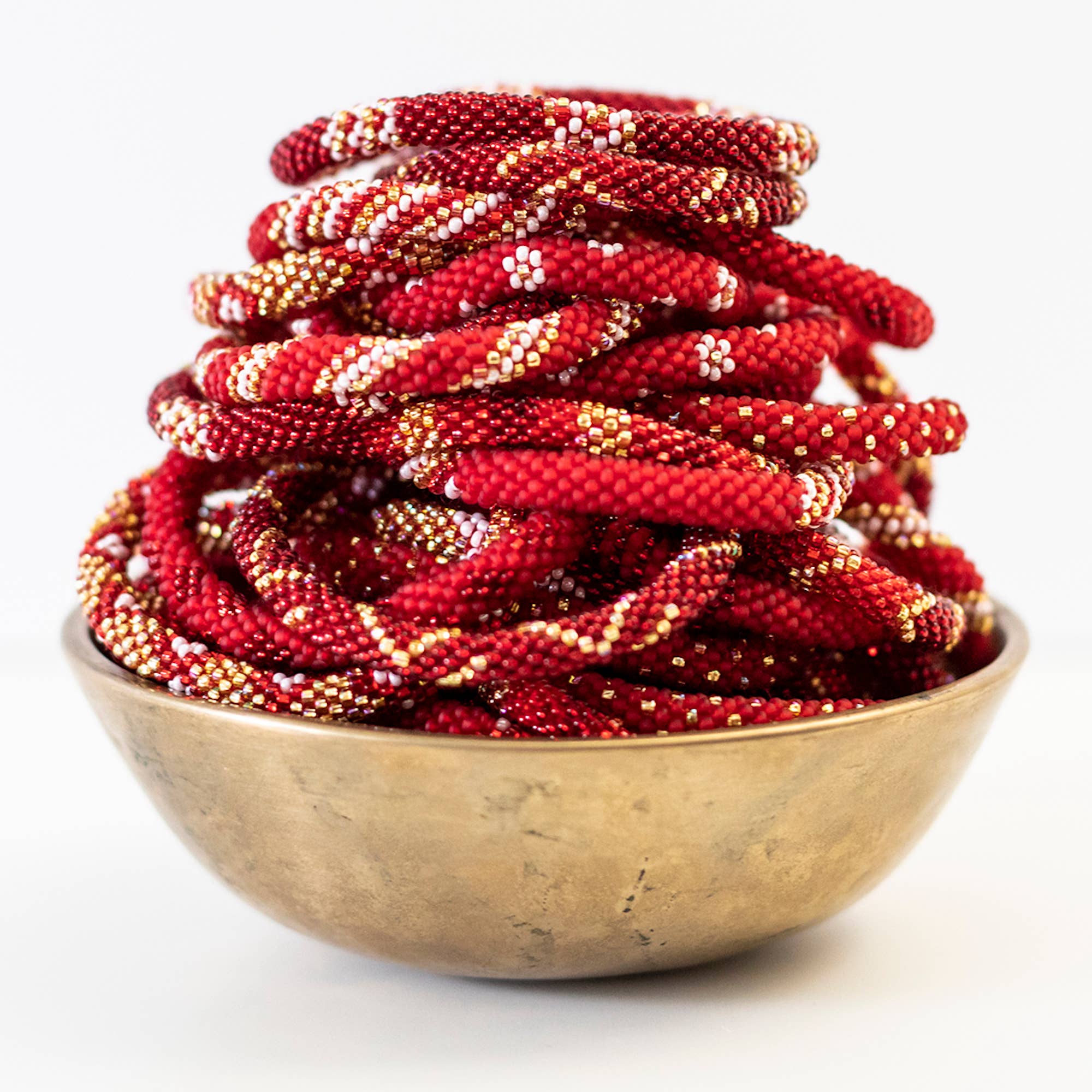 Aid Through Trade - Wholesale Jewelry Set - The Original Roll-On® Bracelet Cinnamon - Set of 121