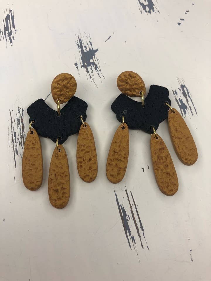 Zwarte en gouden bengel voor wholesale door Buzzy bee clay