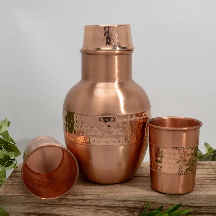 Pure copper set of carafe sequence sphere ± 950 ml with 2 for wholesale by Ayurveda Specialist B.V.