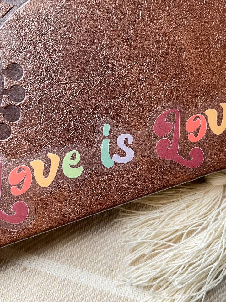 Clear Love is Love Rainbow Waterproof Sticker for wholesale by Meaggie Moos