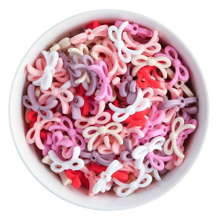 Perles focales en silicone Dainty Bow pour la vente par Cara & Co Silicone Craft Supply