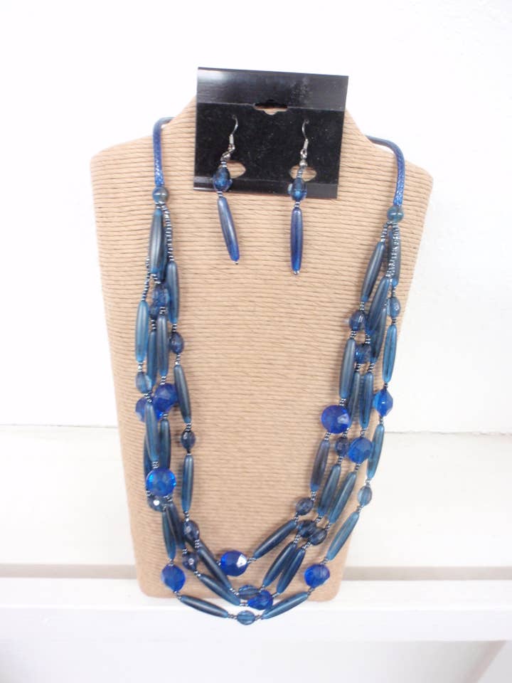 BLUE CORD WITH FOUR STRANDS BLUE BEADS NECKLACE SET 18004 for wholesale by International Duru's