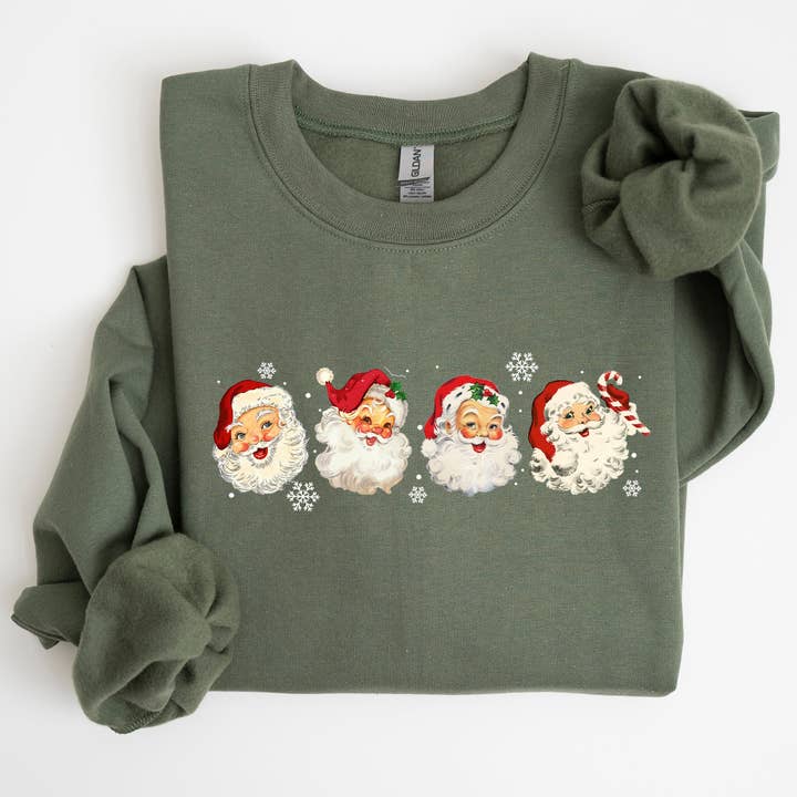 Sweatshirt rétro Pères Noël d'affilée, Noël, hiver, Noël pour la vente par Refinery Number One LLC