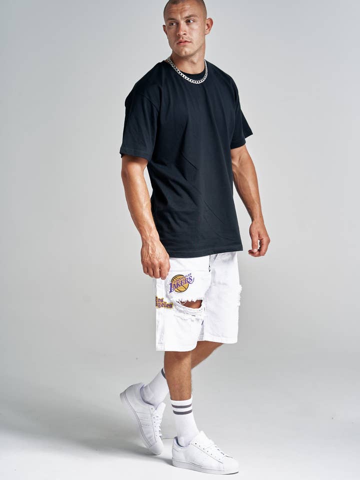 Short déchiré blanc Patch Work pour la vente par UNEFFECTED STUDIOS