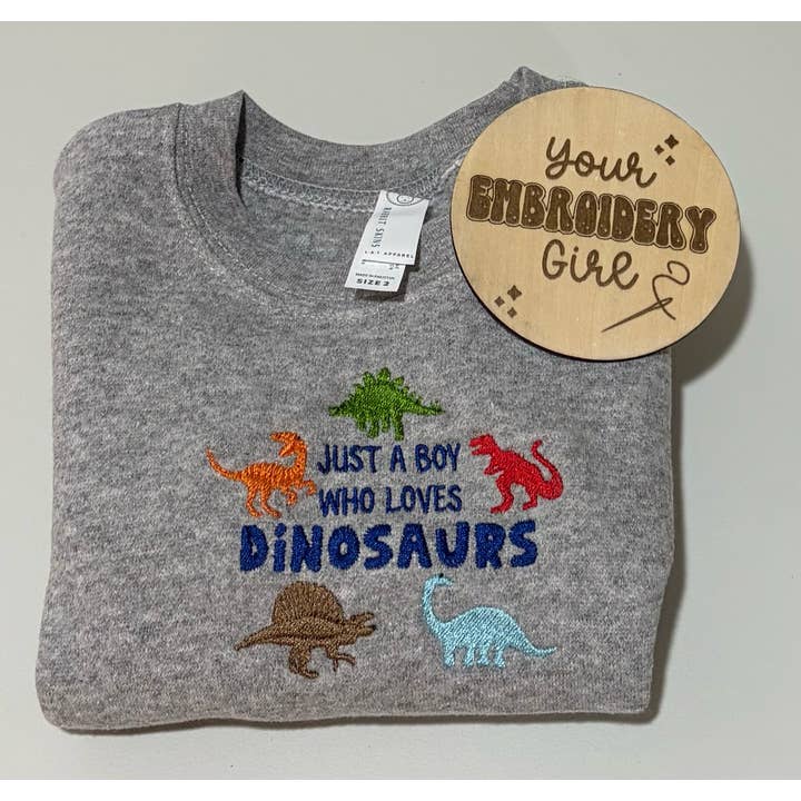 Bare en dreng, der elsker dinosaurer broderet børnetrøje for engroshandel hos Your Embroidery Girl